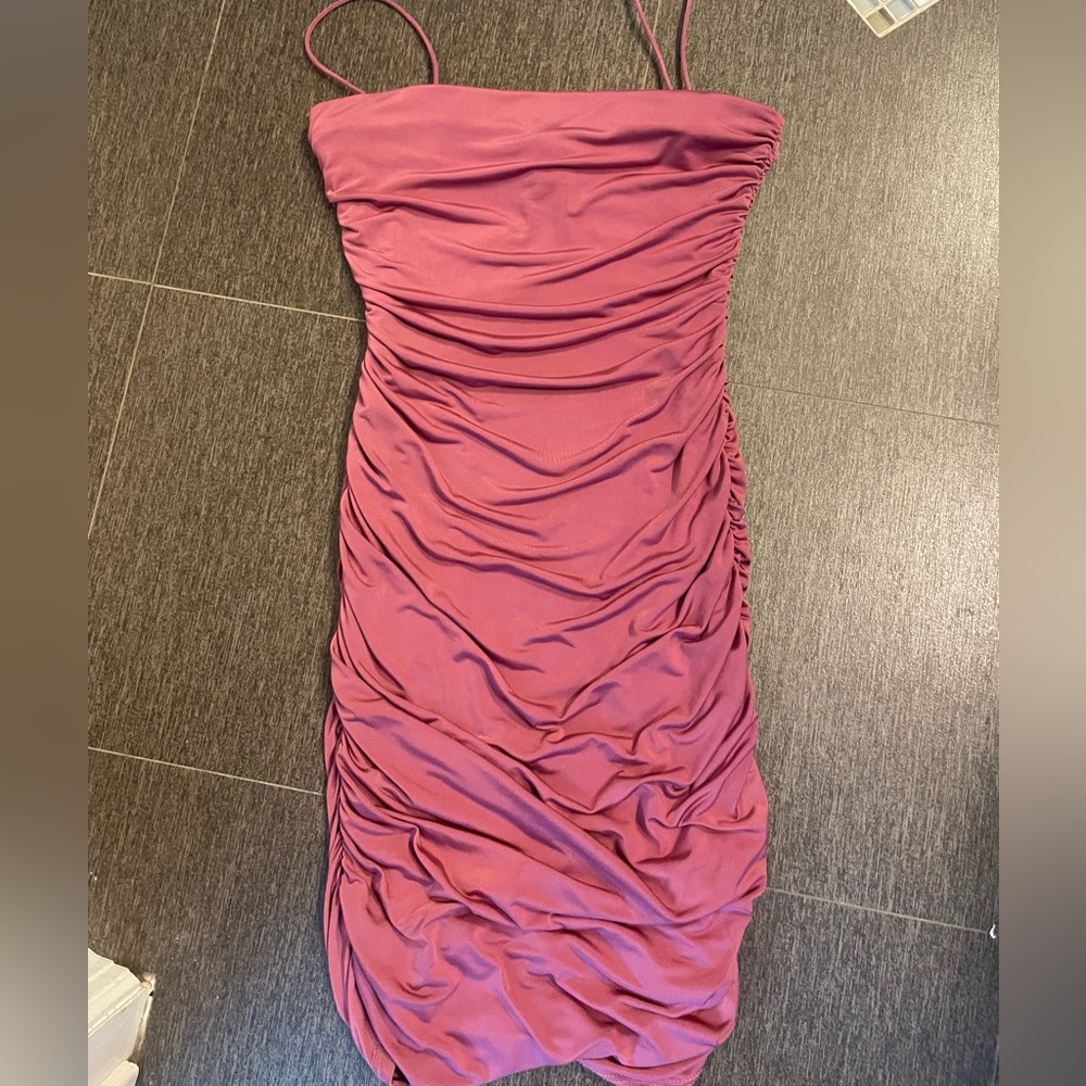 Such a cute mini pink/purple dress! Size XS and only been worn once.